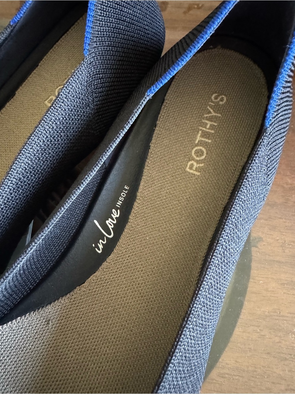 Rothy's Black Pointed-Toe Flats with Brass Buckle and Blue Trim - Picture 2 of 8